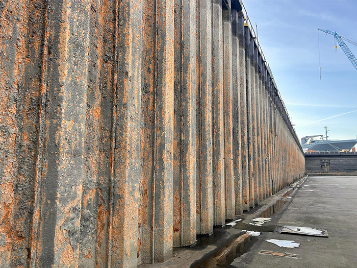 Dry dock sheet pile walls prior to refurbishment. [Image: Steelpaint]