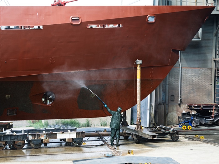 Shortly after execution of the contracts on July 22, HMBS Rolly Gray, a Damen Stan Patrol 4207 offshore patrol vessel, was lifted from the water at Damen Shipyards in Gorinchem, the Netherlands, to commence its scheduled refit and maintenance program. [Photo: Damen]